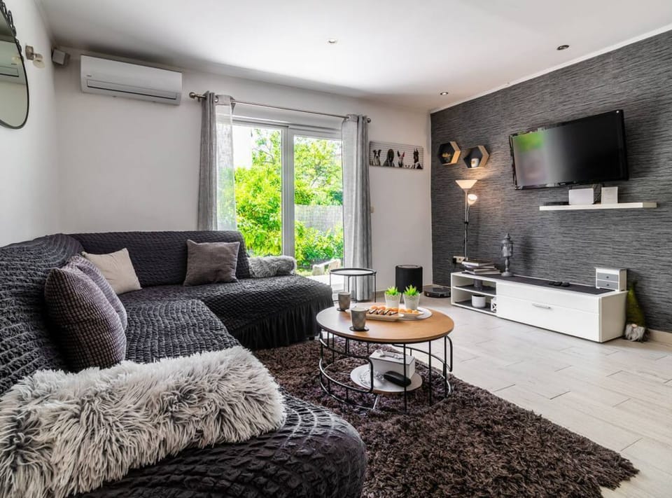 House (Six Bedroom Holiday Home) | Living room | 32-inch flat-screen TV with digital channels