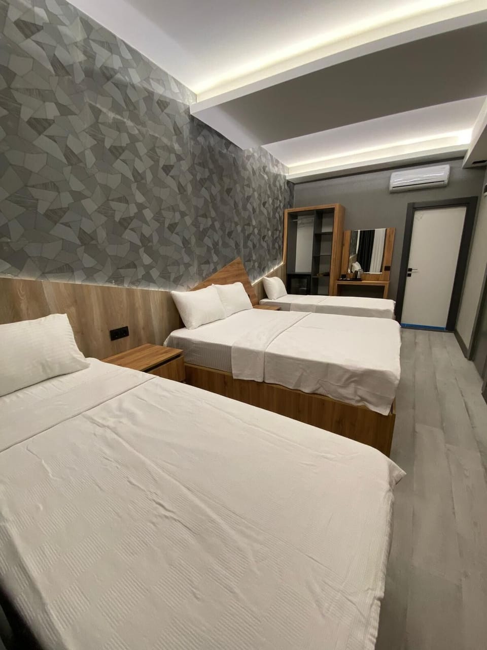 Standard Quadruple Room, Multiple Beds | Frette Italian sheets, premium bedding, blackout drapes, soundproofing