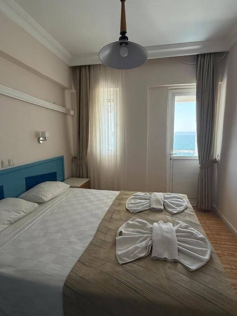 Comfort Quadruple Room, Sea View | Free WiFi, bed sheets