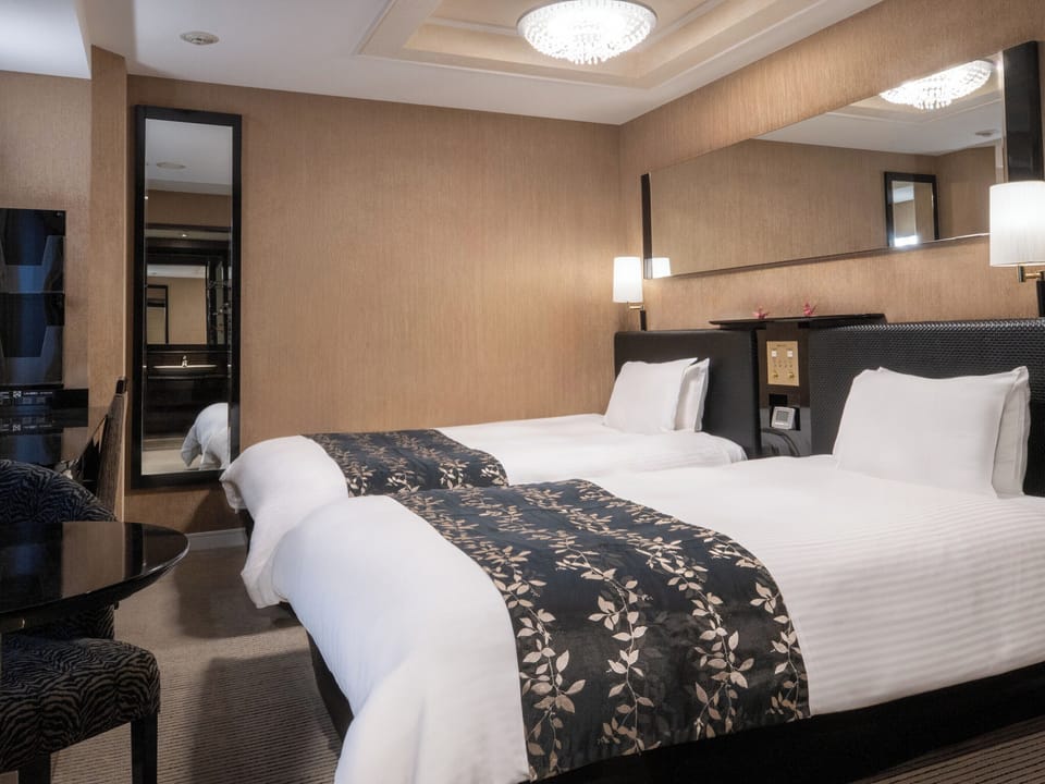 Twin Room, Multiple Beds, Bathtub Grab Bars, Non Smoking | Down comforters, desk, blackout drapes, free WiFi