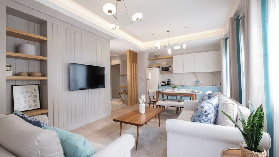 Premium Apartment, Garden View | Hypo-allergenic bedding, in-room safe, desk, laptop workspace