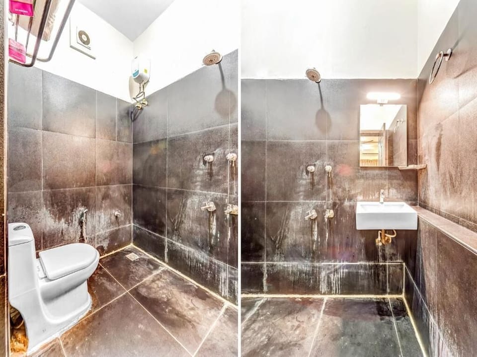 Deluxe Room | Bathroom | Shower, rainfall showerhead, towels