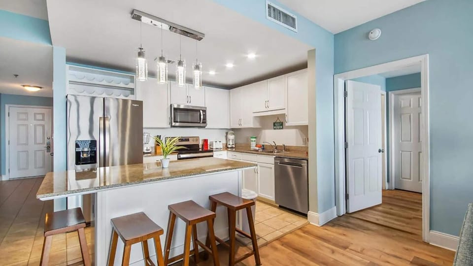 Condo, Multiple Beds (Laketown Wharf 827 - Life's A Beach) | Private kitchen | Oven, cookware/dishes/utensils