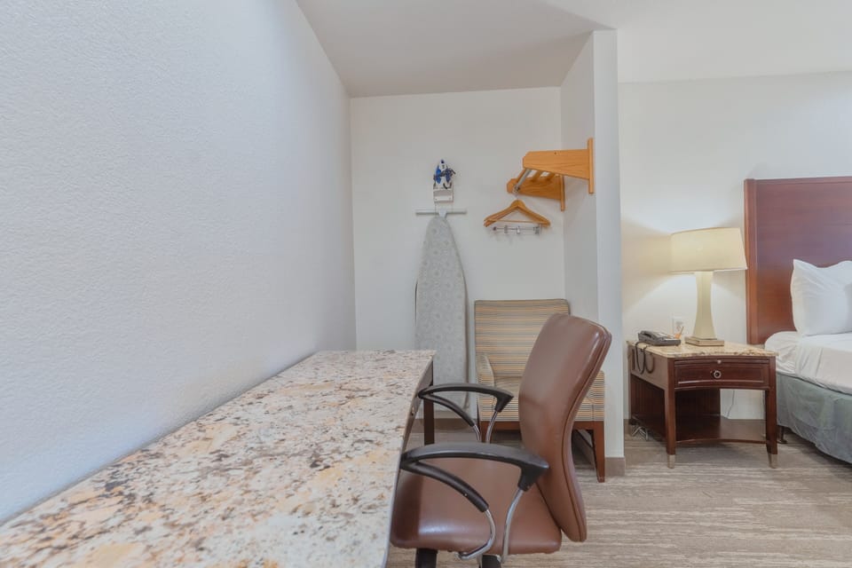 Standard King | Premium bedding, desk, laptop workspace, blackout drapes