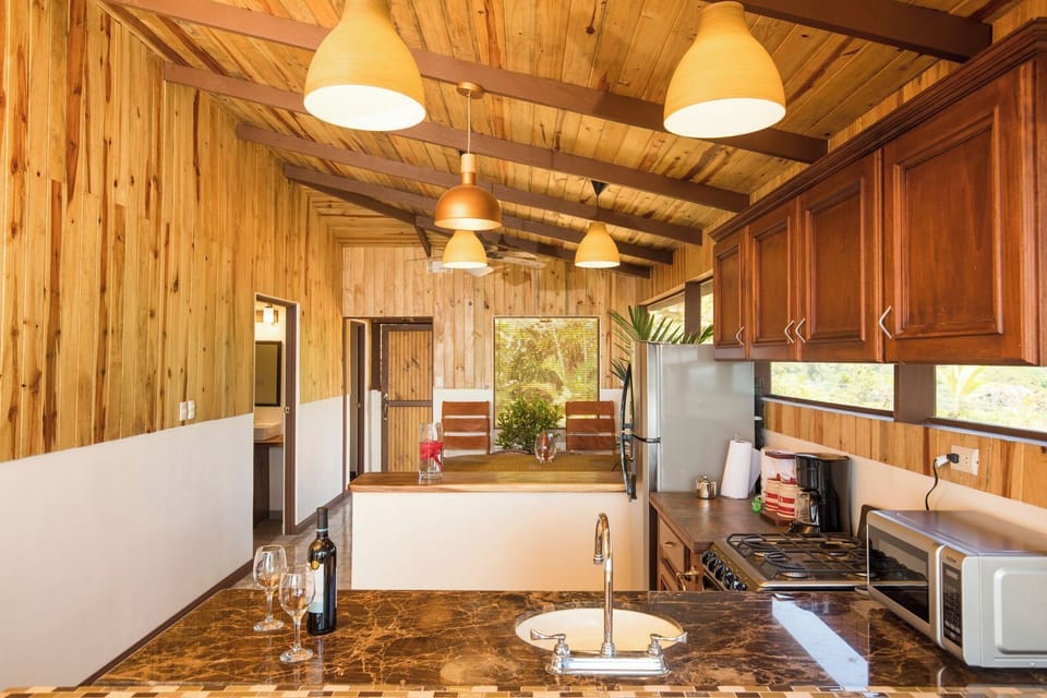 Villa Laurel | Private kitchen | Full-size fridge, microwave, stovetop, coffee/tea maker