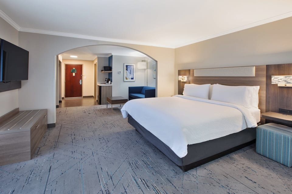 Suite, 1 King Bed with Sofa bed (Additional Living Area) | Desk, iron/ironing board, free cribs/infant beds, free WiFi