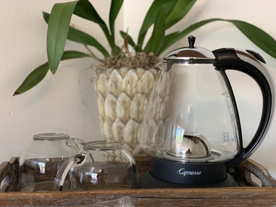 Coffee/tea maker, fridge, microwave