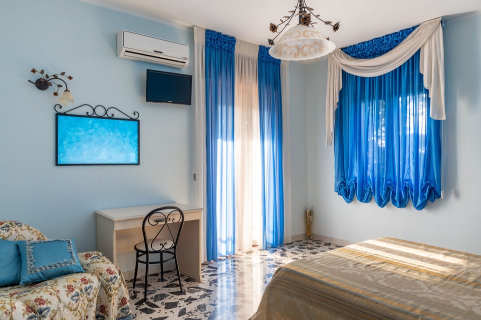 Deluxe Quadruple Room, 2 Bedrooms, Ensuite, Pool View | Desk, laptop workspace, free cribs/infant beds, free WiFi
