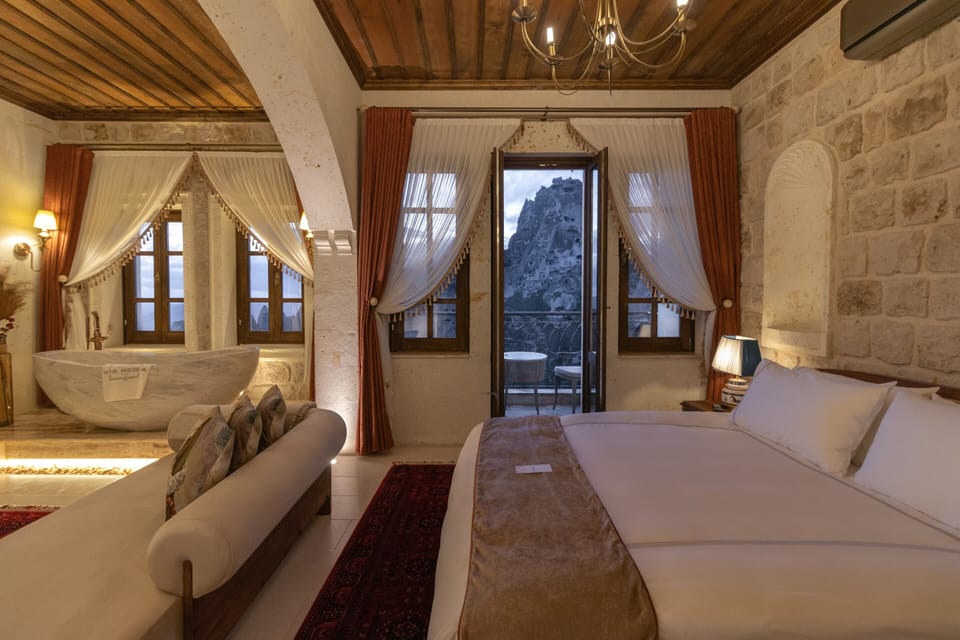VR203 Stone Arched Honeymoon Suite | Premium bedding, memory foam beds, minibar, in-room safe