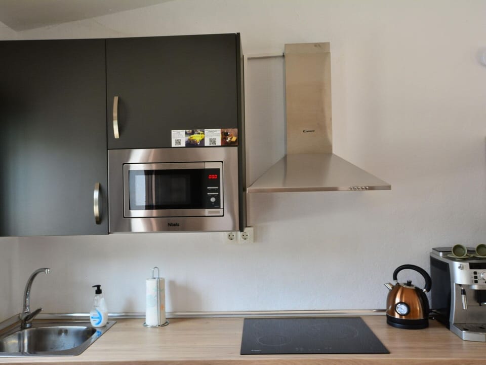 Villa | Private kitchen | Coffee/tea maker, toaster, highchair
