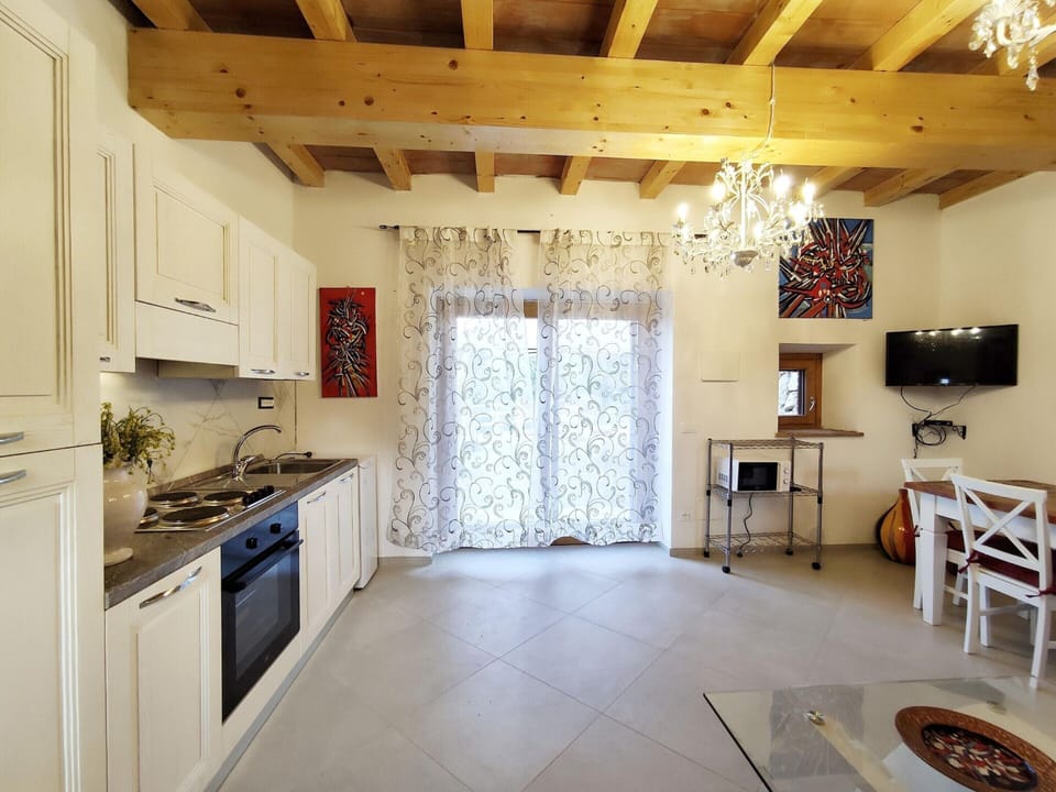 Villa | Private kitchen | Electric kettle, toaster, highchair