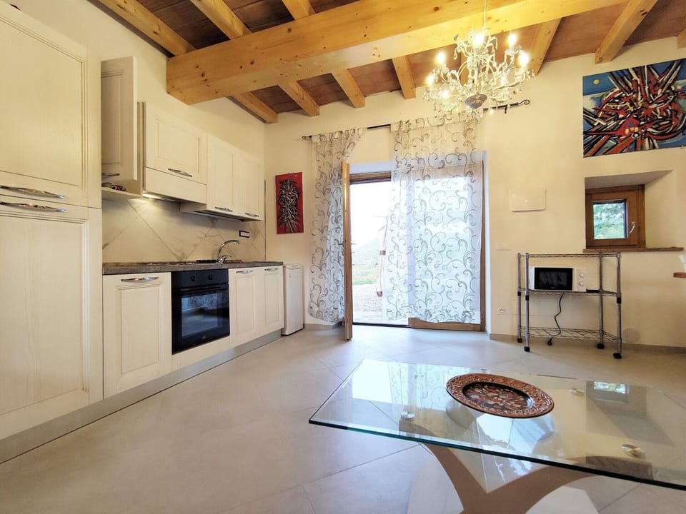 Villa | Private kitchen | Electric kettle, toaster, highchair