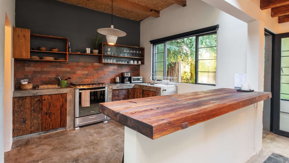 Comfort Chalet | Private kitchen | Coffee/tea maker, full-size fridge, microwave, oven