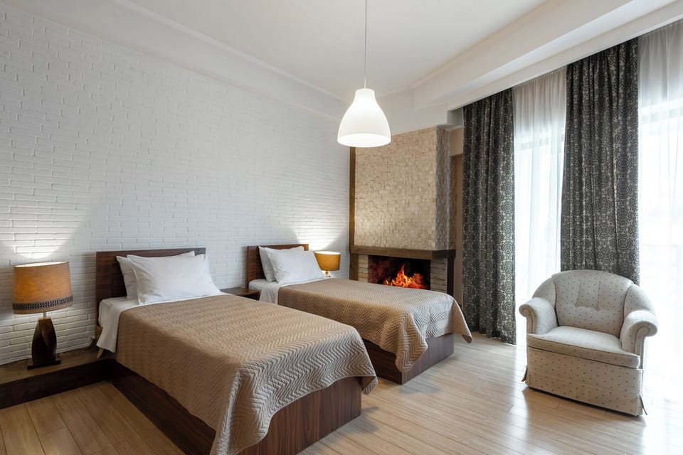Comfort Quadruple Room, Balcony, City View | Hypo-allergenic bedding, desk, laptop workspace, soundproofing