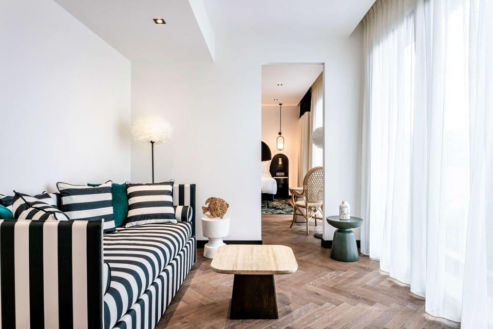 Suite, 1 Bedroom | Living area | 55-inch Smart TV with satellite channels