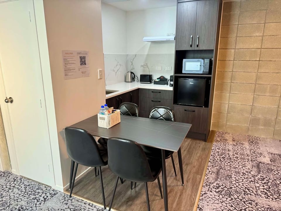Economy Studio, 2 Queen Beds | Private kitchen | Espresso maker, coffee/tea maker, mini-fridge, electric kettle