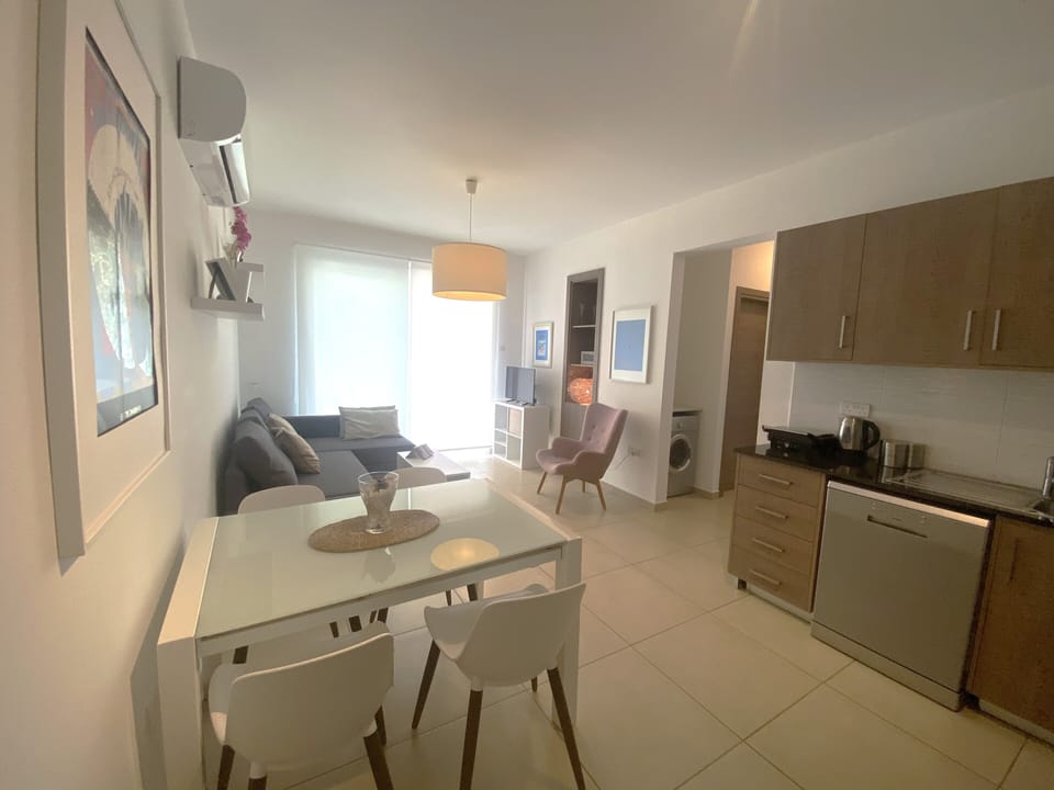 Apartment, Non Smoking, Pool View | Living area | Smart TV