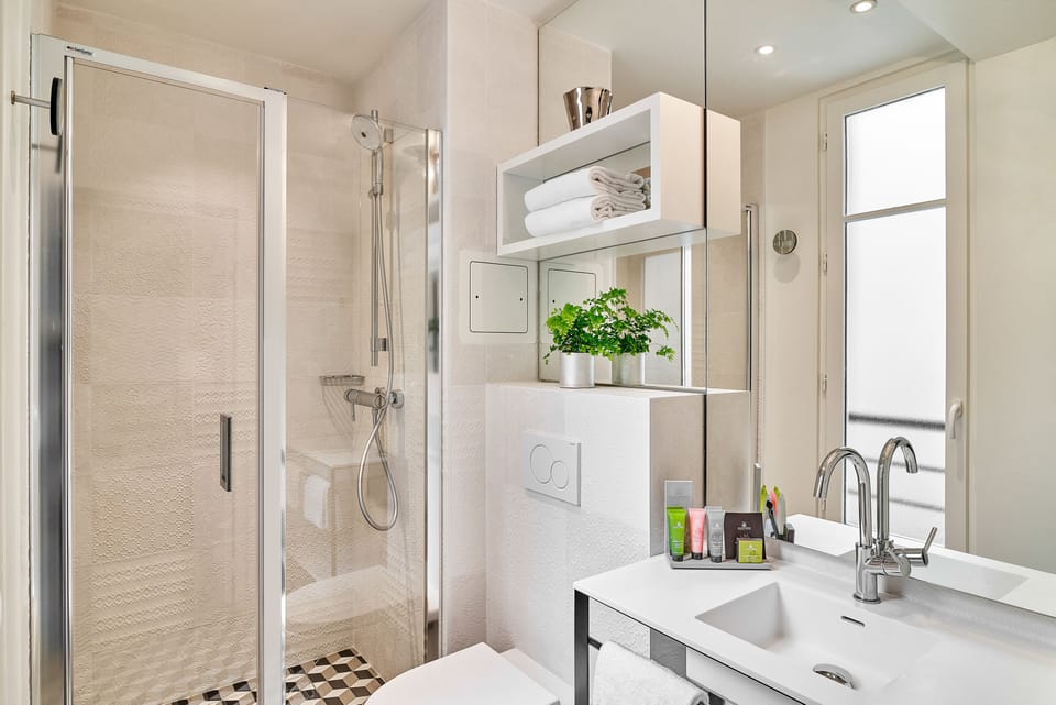 Shower, free toiletries, hair dryer, towels