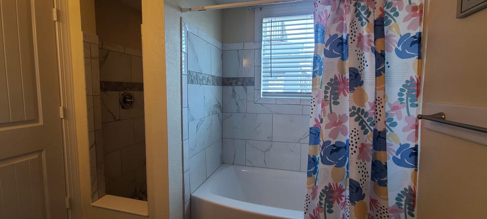 Deluxe Quadruple Room, 2 Queen Beds, Private Bathroom, Ocean View | Bathroom | Towels, soap, shampoo, toilet paper