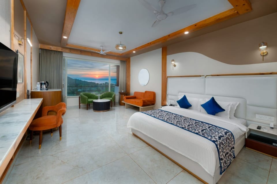 The Grand Premium Sea View Room | Minibar, in-room safe, desk, blackout drapes