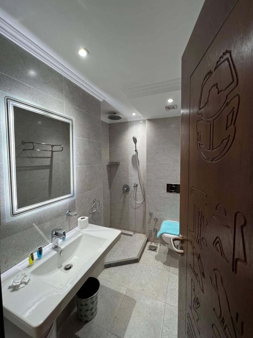 Hair dryer, towels, soap, shampoo