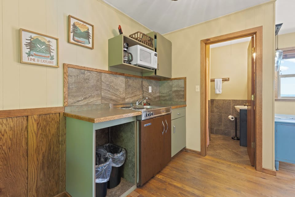 Signature Room, 1 King Bed, Lake View | Iron/ironing board, free WiFi