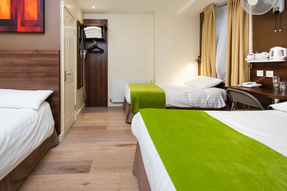 Family Room, Private Bathroom | In-room safe, desk, soundproofing, iron/ironing board