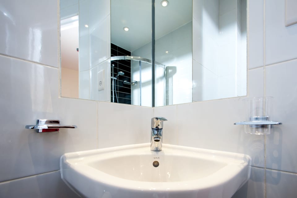 Family Room, Private Bathroom (for 6 people) | Bathroom | Combined shower/tub, free toiletries, hair dryer, towels