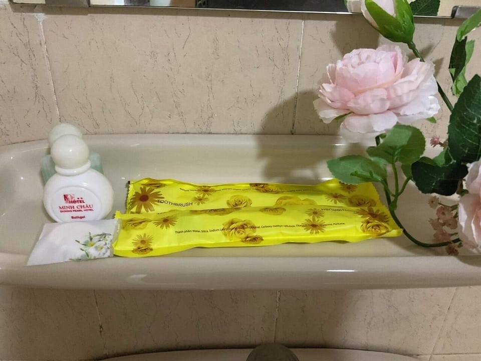 Shower, slippers, bidet, towels