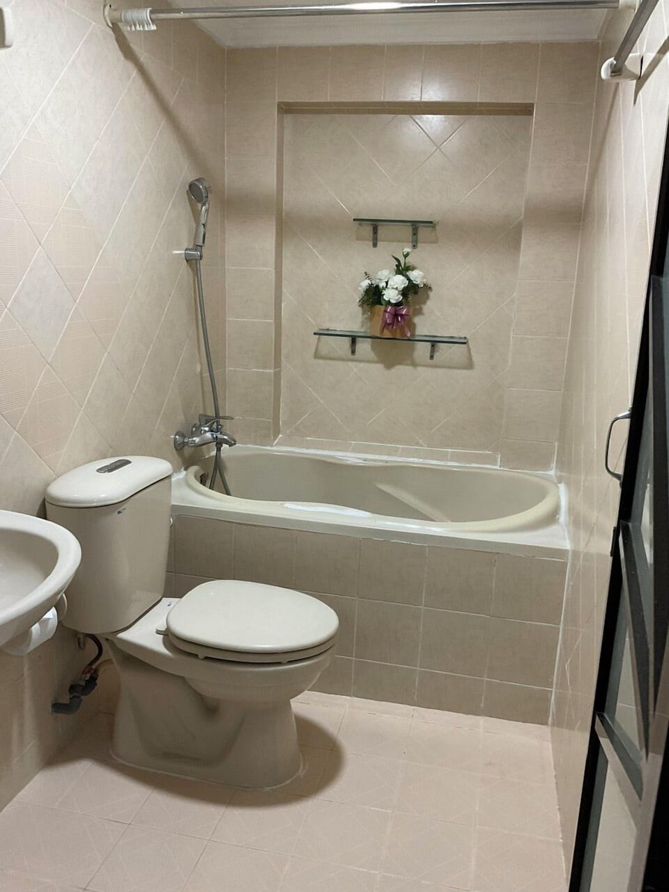Shower, slippers, bidet, towels