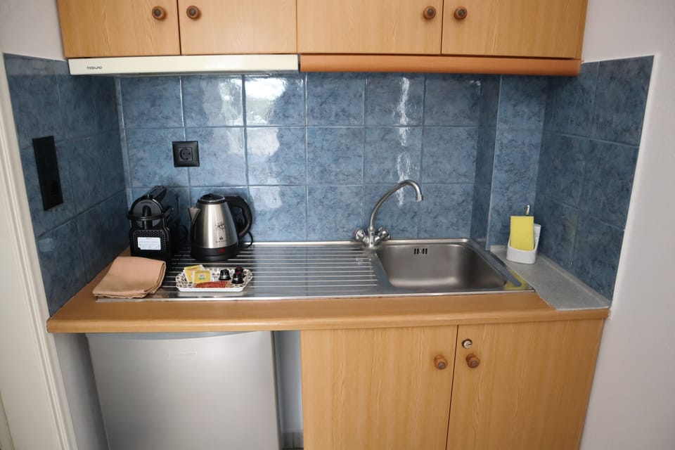 Mini-fridge, espresso maker, electric kettle