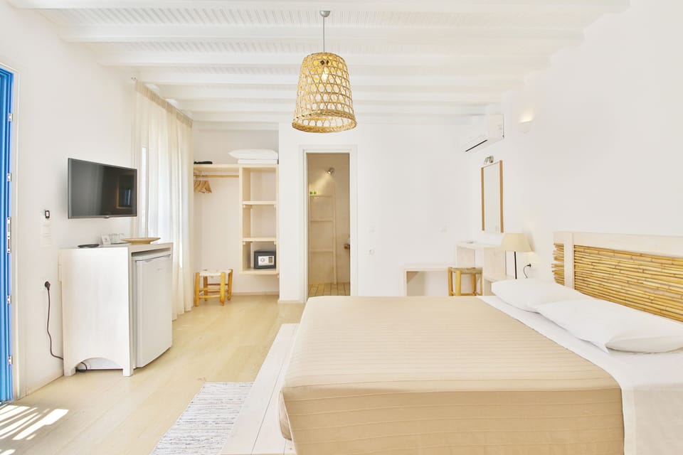 Double Room, Patio, Partial Sea View | In-room safe, laptop workspace, free WiFi, bed sheets