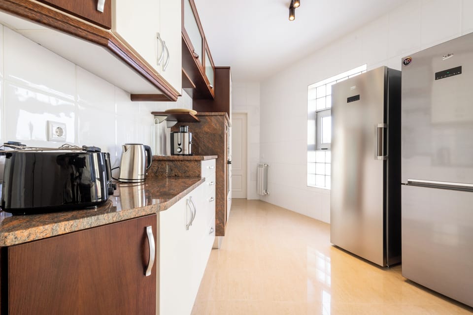 Superior Villa | Private kitchen | Electric kettle, toaster, highchair