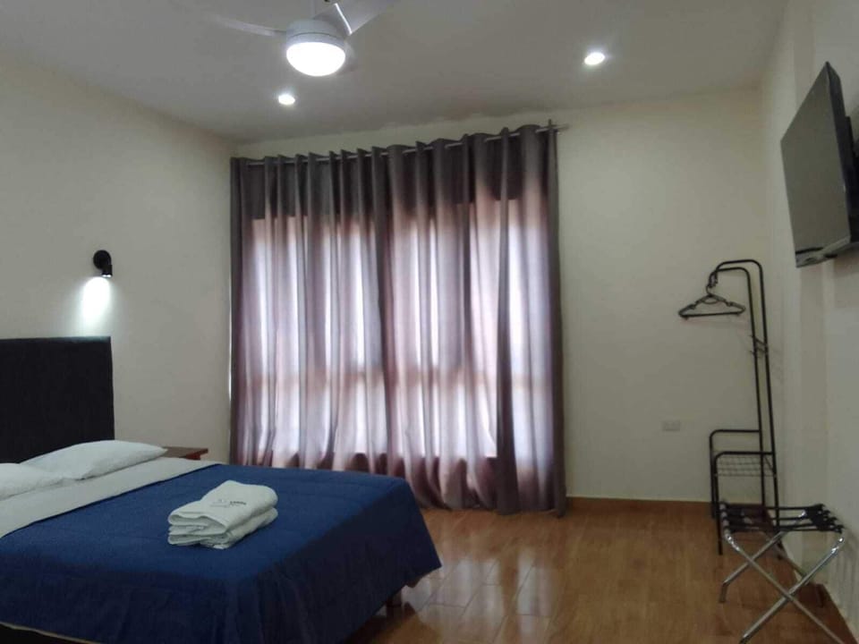 Standard Room, City View | Down comforters, desk, laptop workspace, blackout drapes