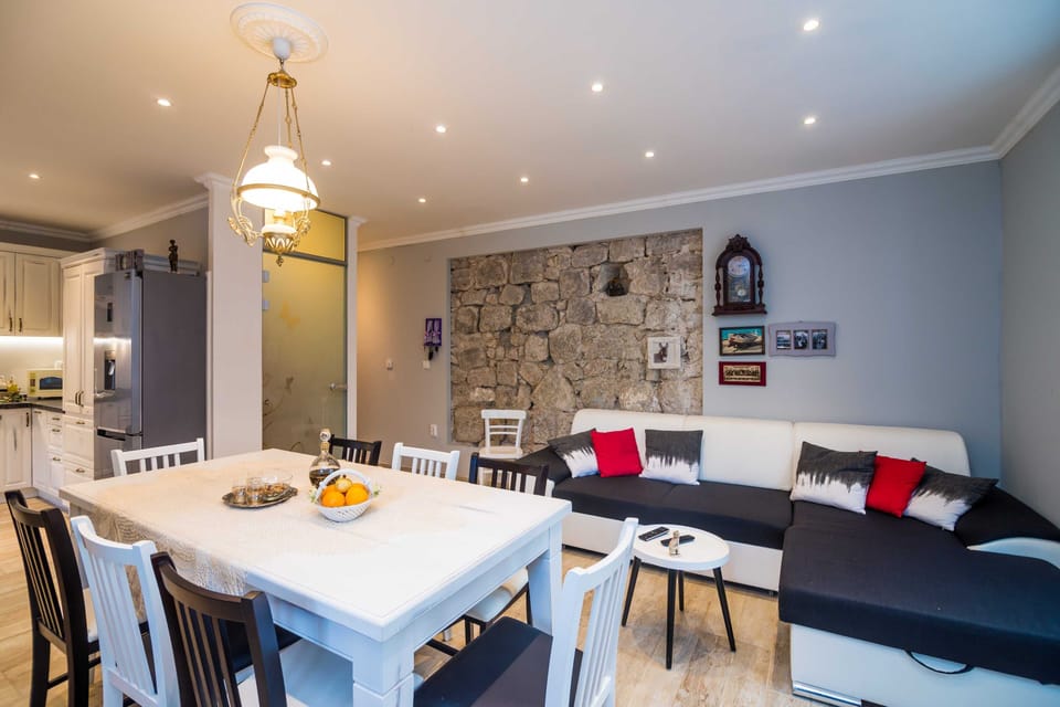 Villa (Three-Bedroom Villa with Terrace and ) | Dining room