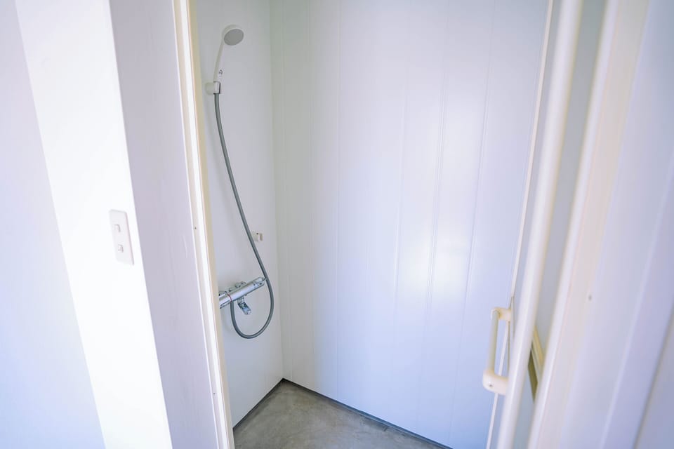 Shower, hair dryer, soap, shampoo