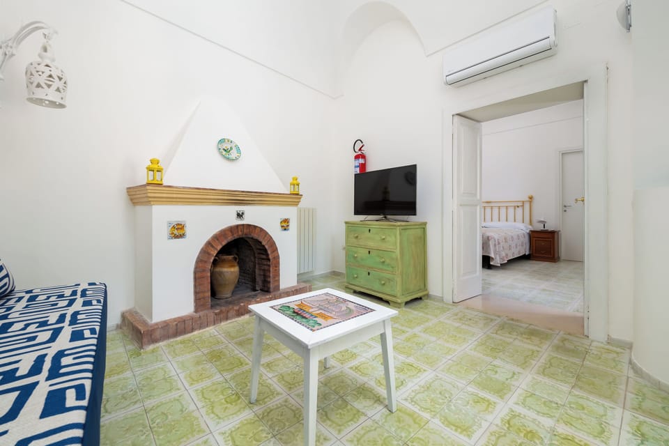 Panoramic Townhome, Sea View | Living area | 40-inch flat-screen TV with digital channels