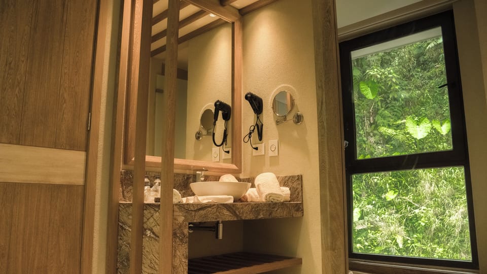 Premium Suite, 1 King Bed with Sofa bed, Private Bathroom | Premium bedding, down comforters, blackout drapes, free WiFi