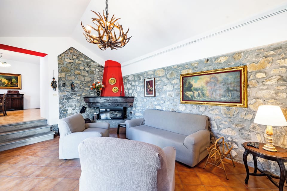 Standard House, Multiple Bedrooms, Mountainside (Casa Sant'Anna - In Garfagnana) | Living area | Flat-screen TV, fireplace, DVD player