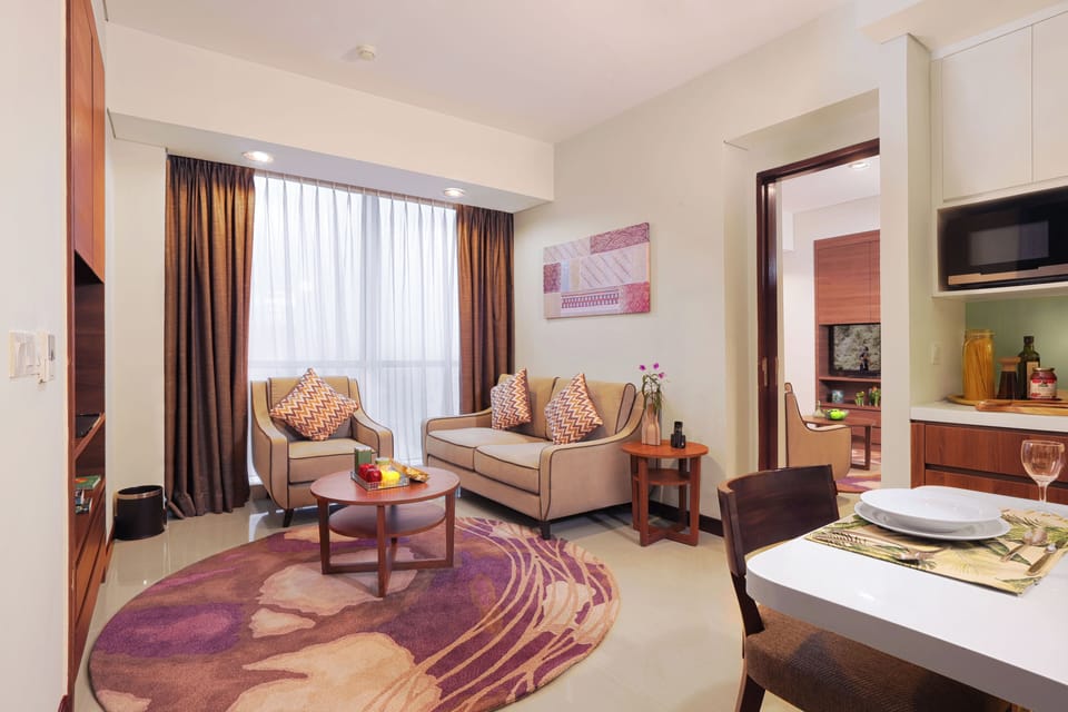 Club Apartment, 2 Bedrooms | Private kitchenette | Full-size fridge, dining tables