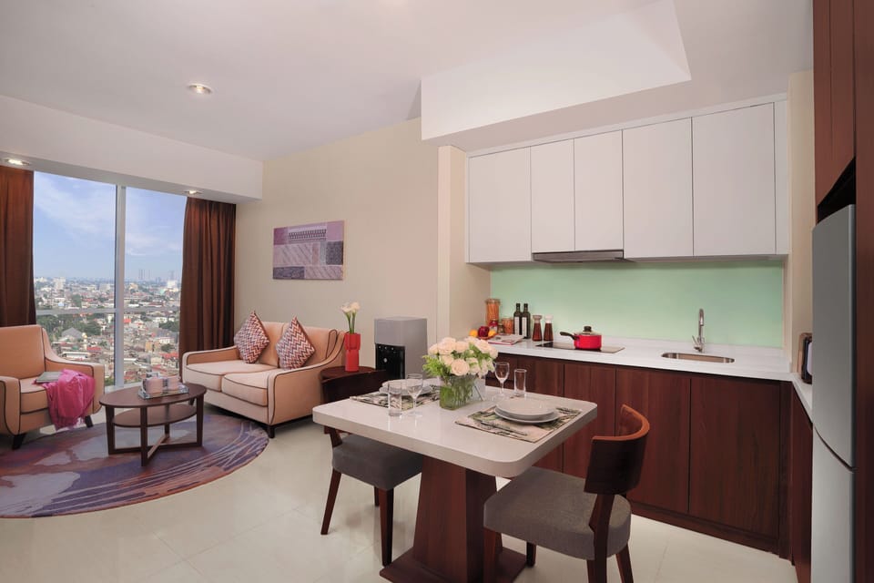 Full-size fridge, dining tables