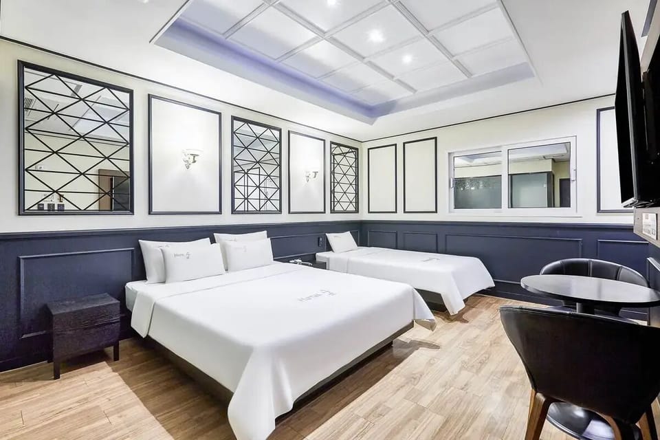 Deluxe Double or Twin Room, Multiple Beds | Desk, laptop workspace, free WiFi