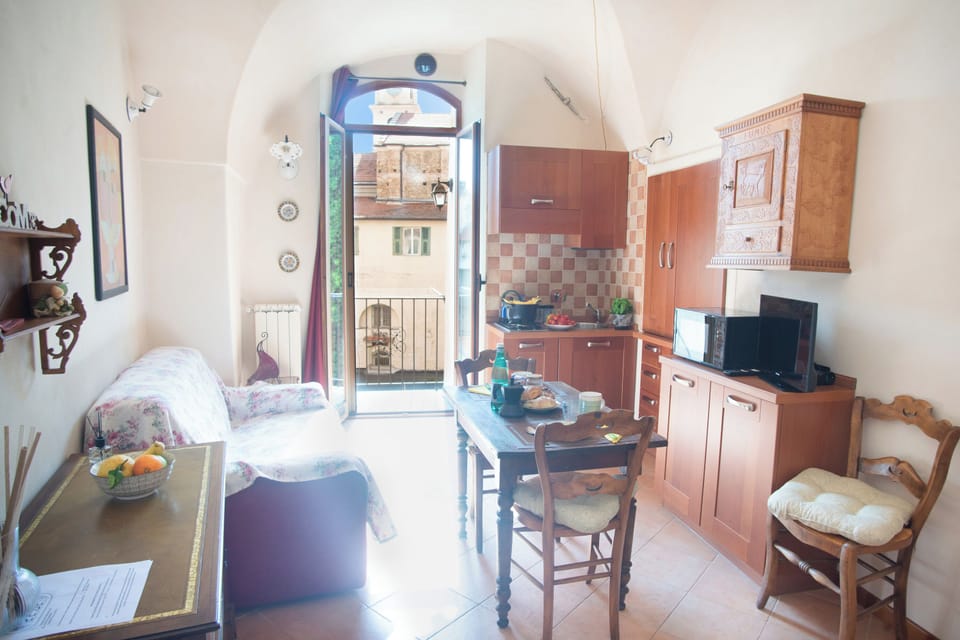 Family Apartment, Multiple Bedrooms (Casa di Lella) | Living area | Flat-screen TV
