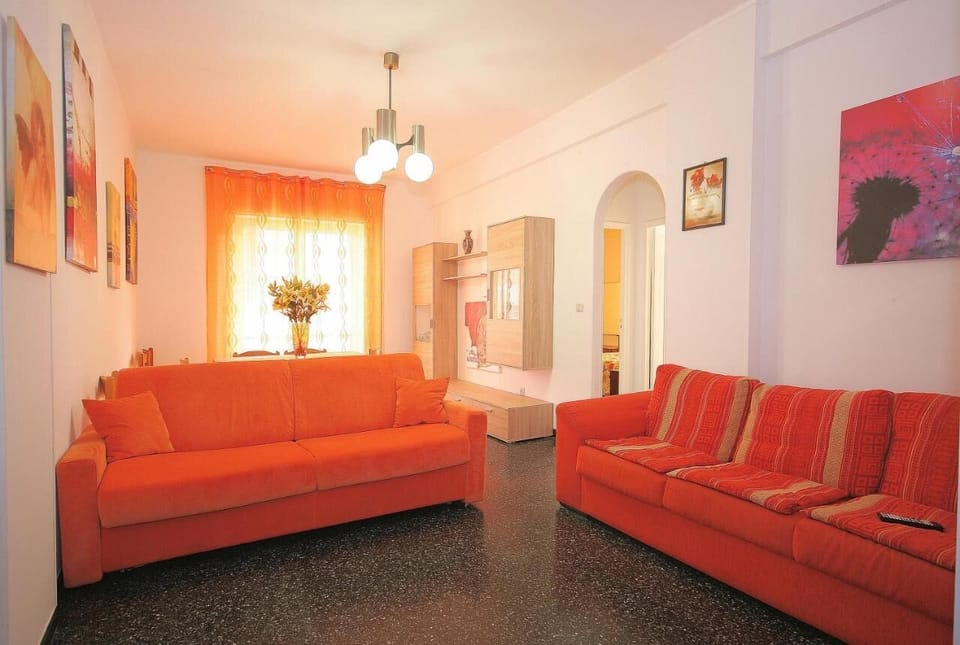 Apartment (2 Bedrooms) | Living area | 55-inch TV with cable channels