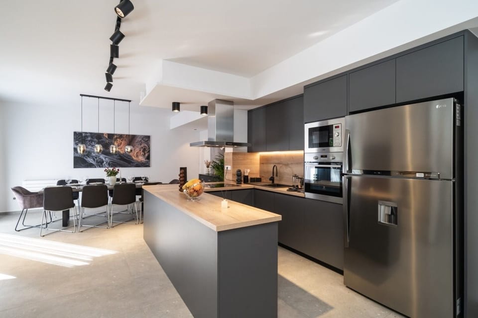 Exclusive Villa | Private kitchen | Full-size fridge, microwave, oven, stovetop