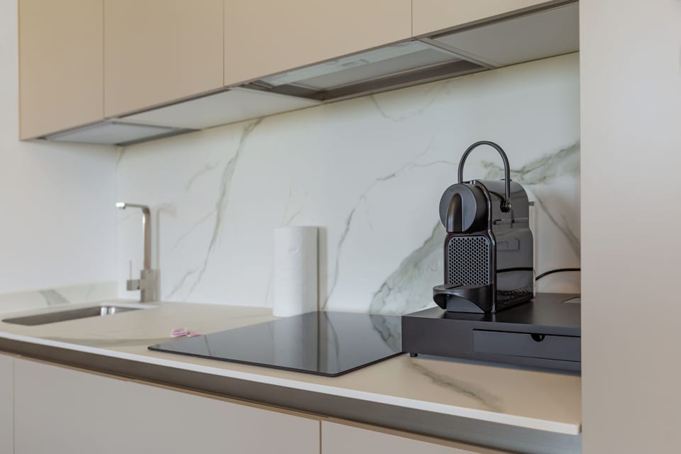 Suite, 1 King Bed with Sofa bed, Non Smoking, Garden View | Private kitchen | Full-size fridge, microwave, oven, stovetop
