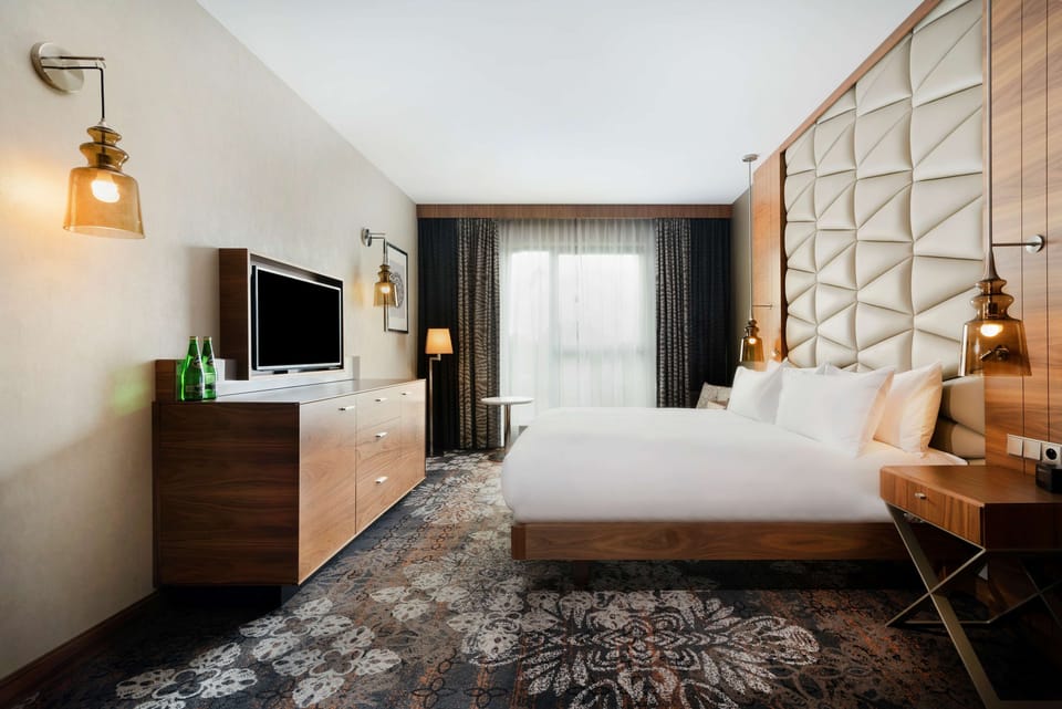 Suite, 1 Bedroom, Non Smoking | In-room safe, laptop workspace, iron/ironing board, cribs/infant beds