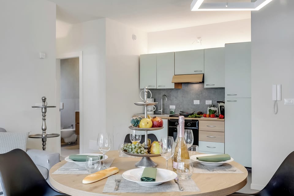 Family Apartment, 1 Bedroom, Balcony, Lakeside (Appartamento 30 Nodi 2 Torbole-Arco) | Private kitchen | Fridge, microwave, stovetop, coffee/tea maker
