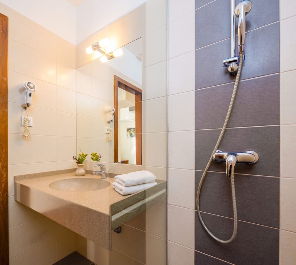 Bathroom | Shower, hair dryer, towels