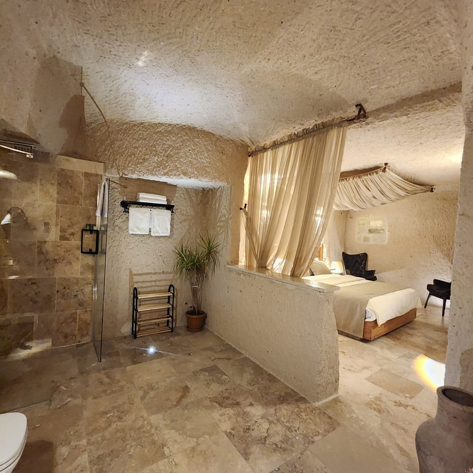 Mazaka Cave Room | Premium bedding, memory foam beds, minibar, in-room safe